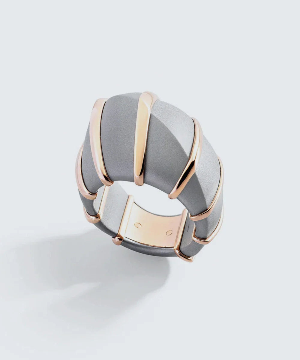 Ring Featuring A Gray Stone Centerpiece in a sleek high-contrast midnight luxury editorial style